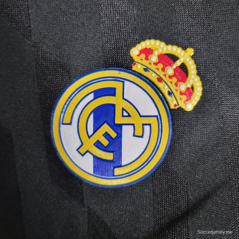 قميص بأكمام طويلة ريترو 2011/12 ريال مدريد ذهاباً وإياباً أسود اللون
