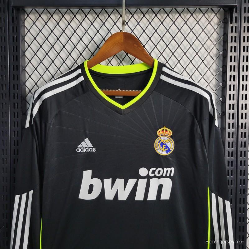 قميص كرة قدم ريترو 10-11 ريال مدريد ذهاباً وإياباً أسود بأكمام طويلة
