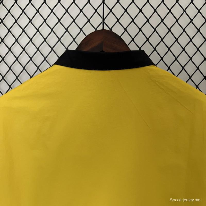 24/25 سترة ريـال مدريد صفراء/حمراء عاكسة قابلة للرياح