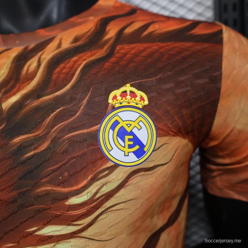 إصدار اللاعب 25/26 ريال مدريد 25/26 قميص ريال مدريد زها برتقالي مع قميص محارب التنين