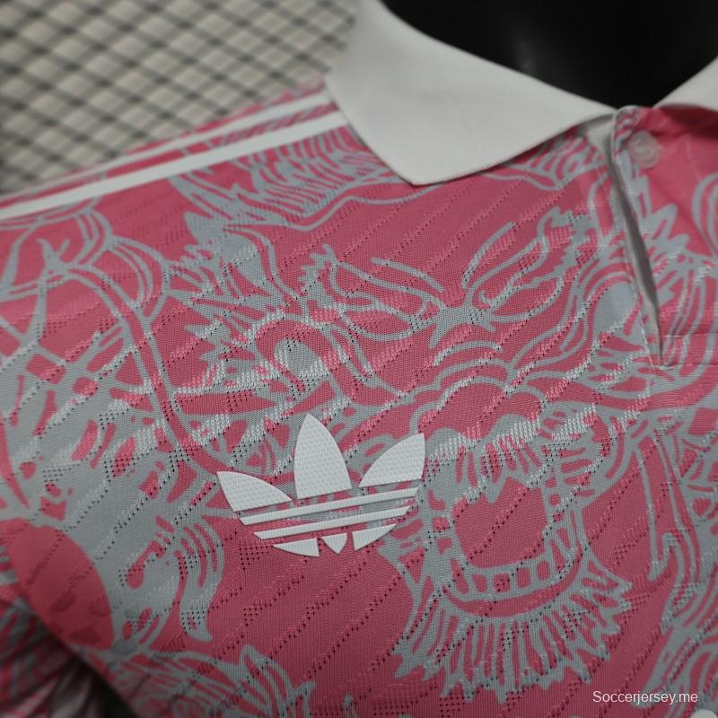 قميص ريال مدريد 25/26 إصدار اللاعب 25/26 وردي بنقشة التنين