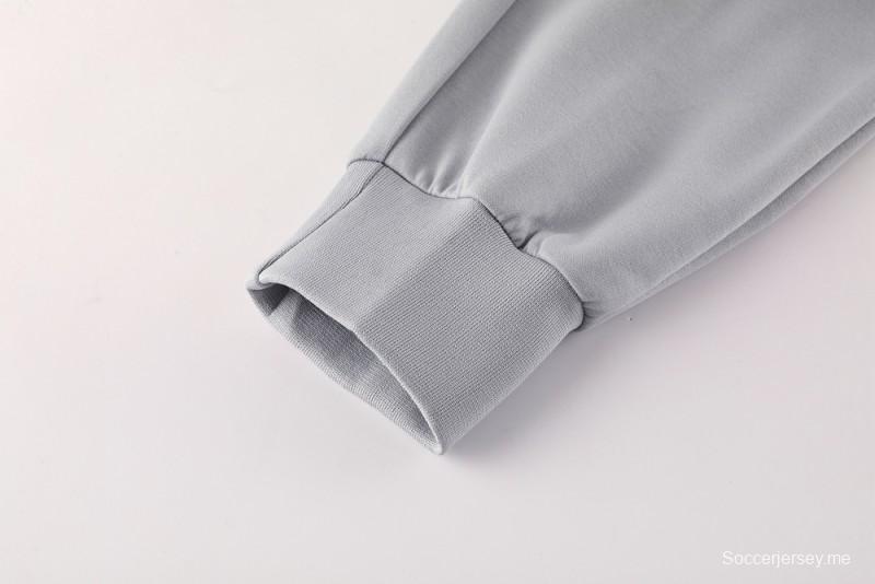 25/26 مانشستر يونايتد هويد جاكيت بسحاب كامل رمادي اللون هويد 25/26 مانشستر يونايتد + بنطلون طويل