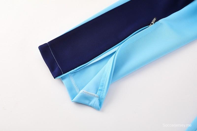 طقم بدلة رياضية نايك إير 2025 - أزرق فاتح مع لمسات كحلية اللون أزرق فاتح مع جاكيت بسحاب كامل + بنطال طويل