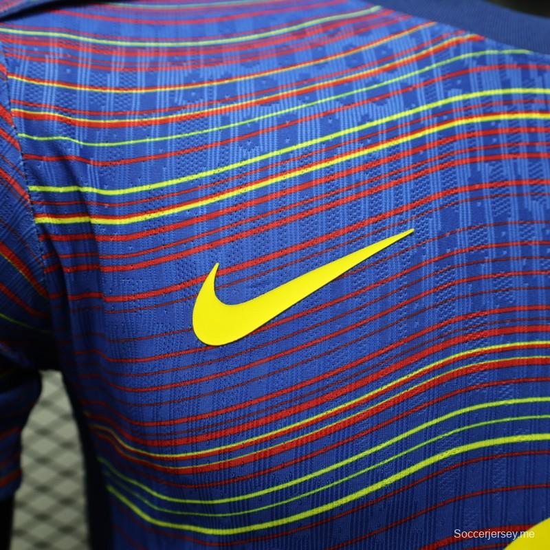 إصدار اللاعب 25/26 قميص نادي برشلونة أزرق بخطوط موجية ملونة