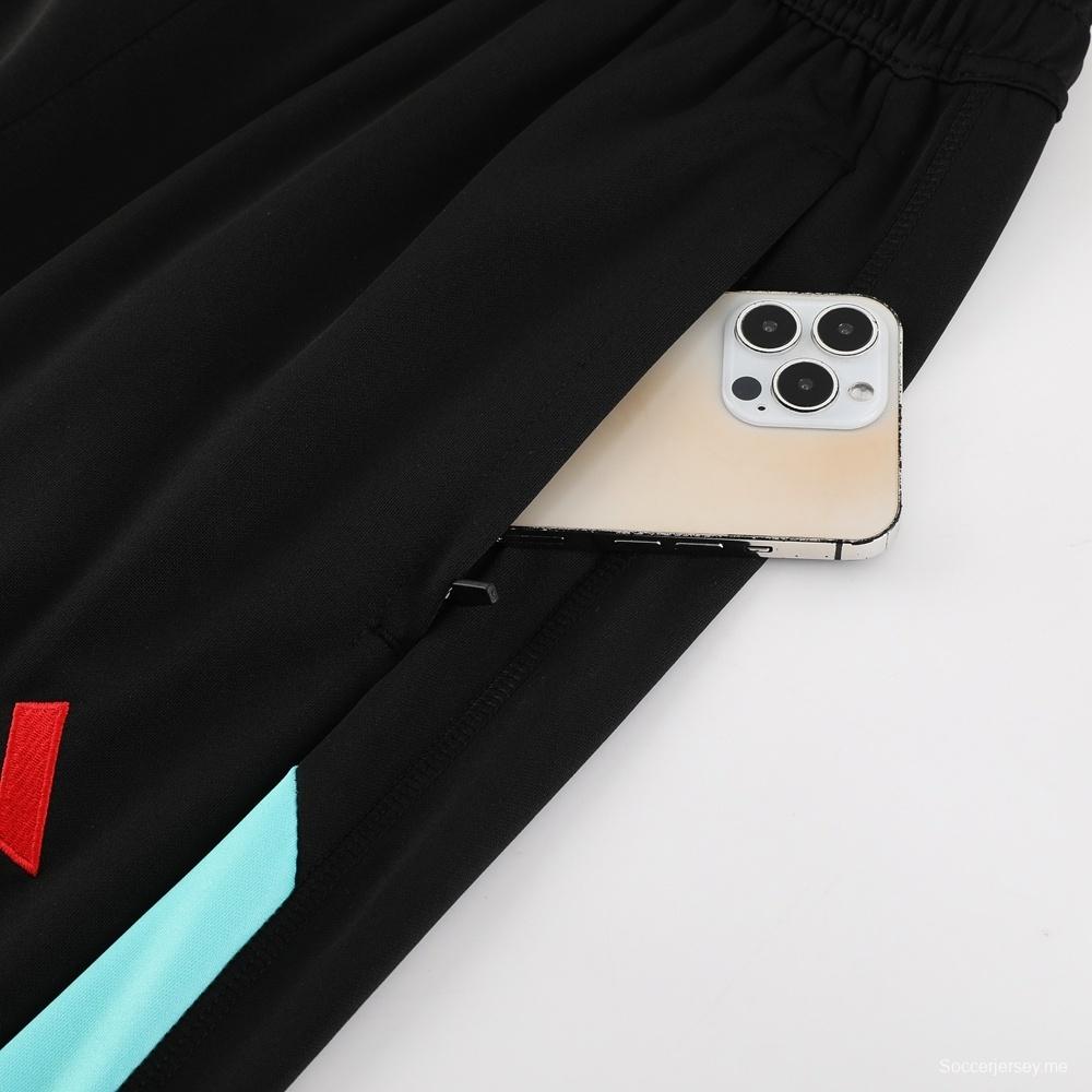 25/26 مانشستر يونايتد جاكيت أسود نصف سحاب + بنطلون طويل + بنطلون طويل