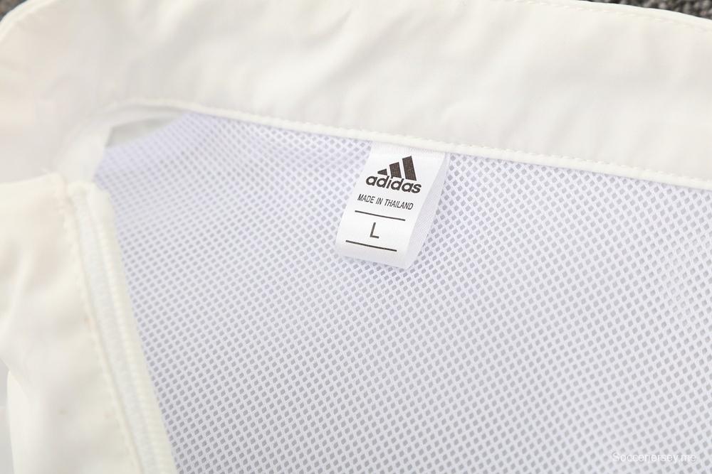 25/26 مانشستر يونايتد أبيض S-3XL مانشستر يونايتد سترة نصف سحاب + بنطلون طويل + بنطلون أبيض S-3XL