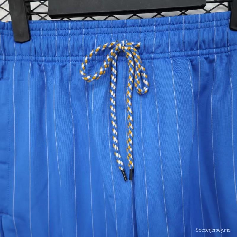 25/26 شورت ريال مدريد أزرق بخطوط بيضاء مقلمة