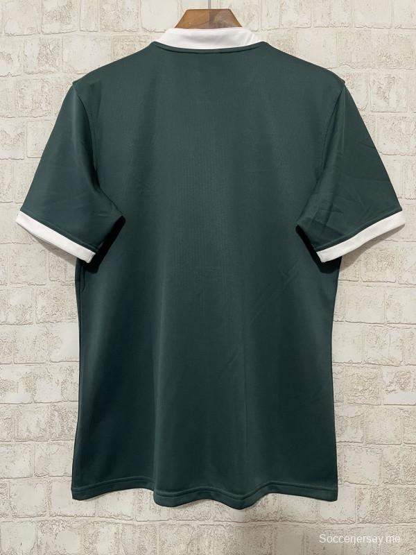 2025 قميص الأسود البريطانية والأيرلندية 2025 أخضر غامق بحواف بيضاء