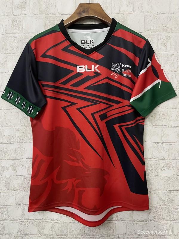 2026 قميص كينيا 2026 أحمر بخطوط هندسية سوداء وأكمام خضراء
