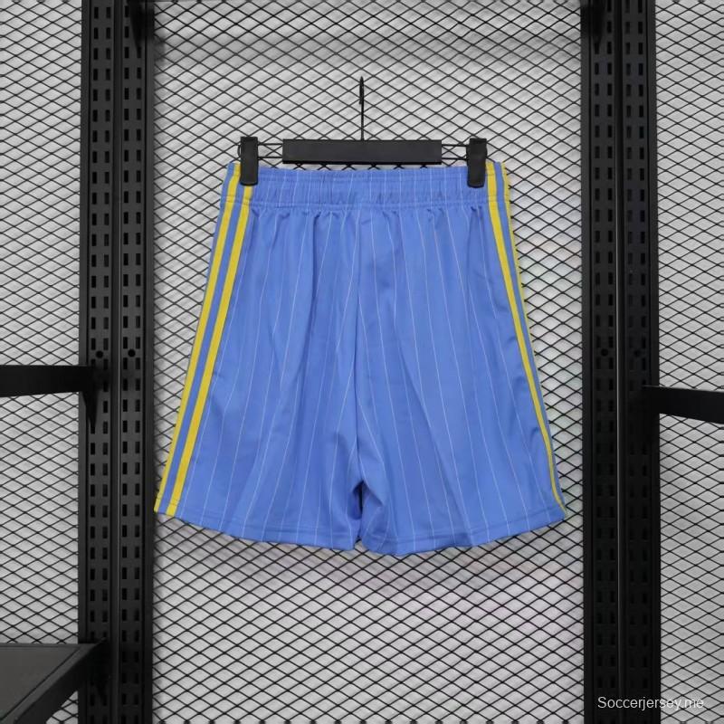 نسخة اللاعب القديمة 1990/91 مانشستر يونايتد الثالثة باللون الأزرق السماوي مع شورت بنقشة الخطوط الدبابيس