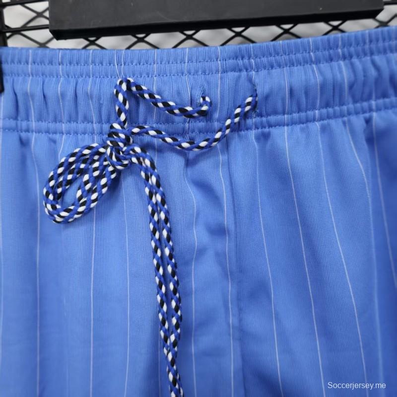 نسخة اللاعب القديمة 1990/91 مانشستر يونايتد الثالثة باللون الأزرق السماوي مع شورت بنقشة الخطوط الدبابيس