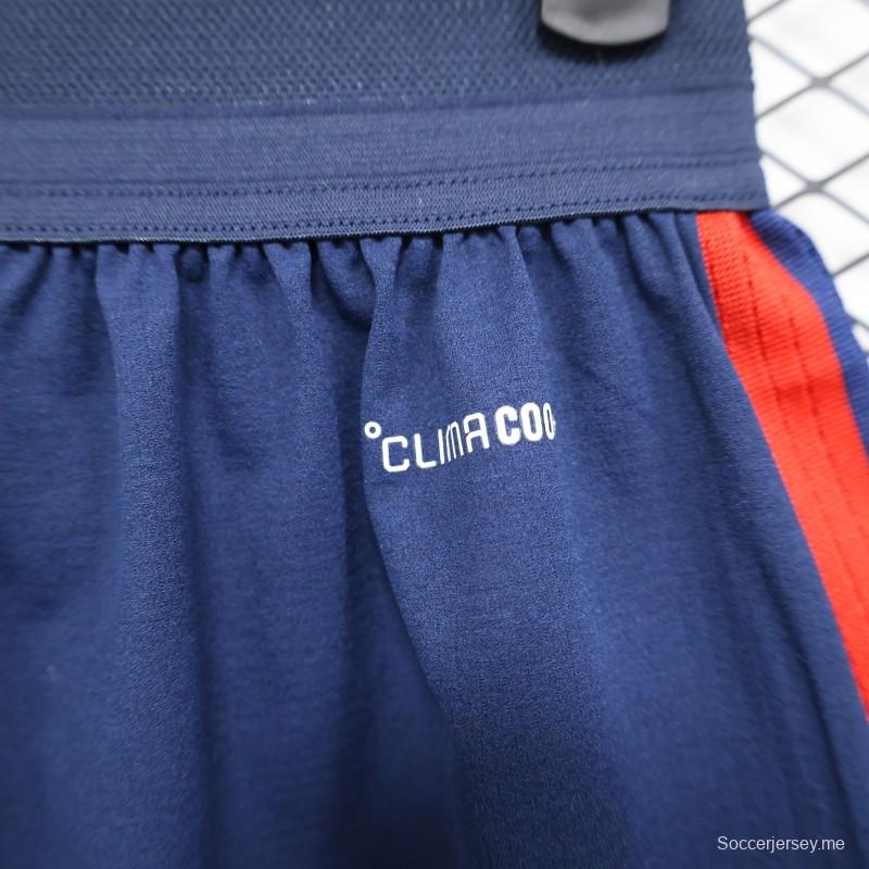 2026 نسخة اللاعب إسبانيا أزرق داكن مع شورت بخطوط حمراء وصفراء