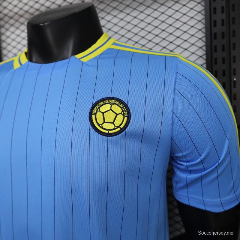قميص اللاعب الإصدار 2026 بلون أزرق كولومبي مع أيقونات التراس