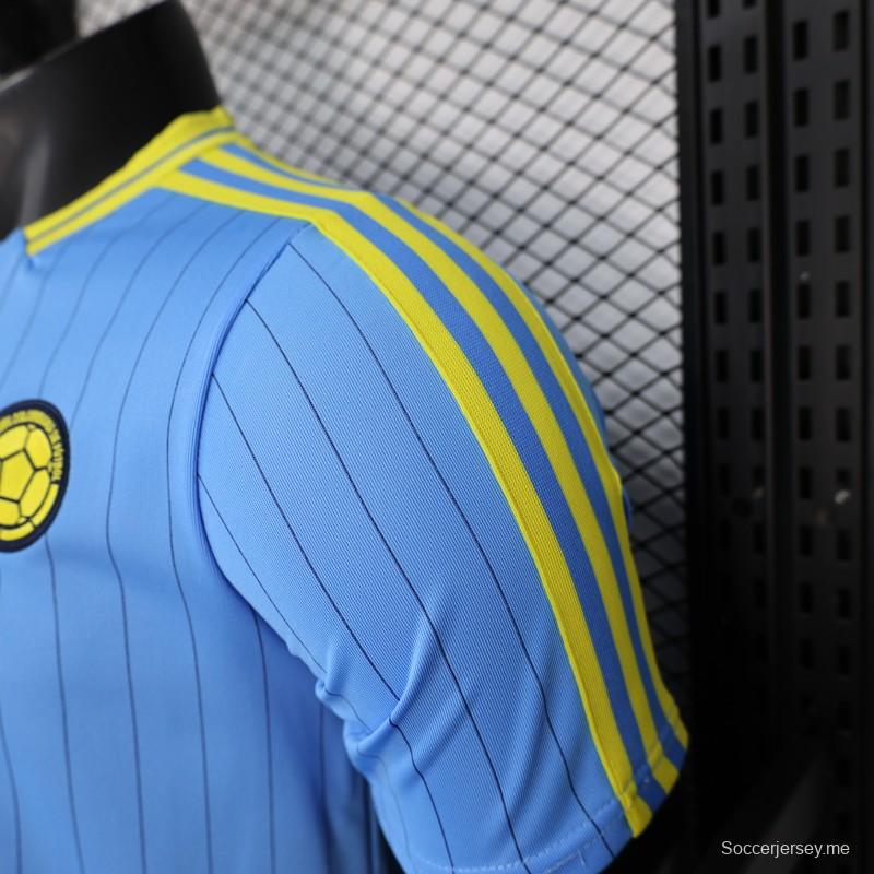 قميص اللاعب الإصدار 2026 بلون أزرق كولومبي مع أيقونات التراس