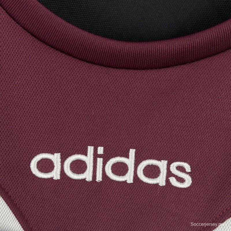 قميص نيوكاسل يونايتد للعب خارج أرضه من موسم 1995/96 (تصميم كلاسيكي)