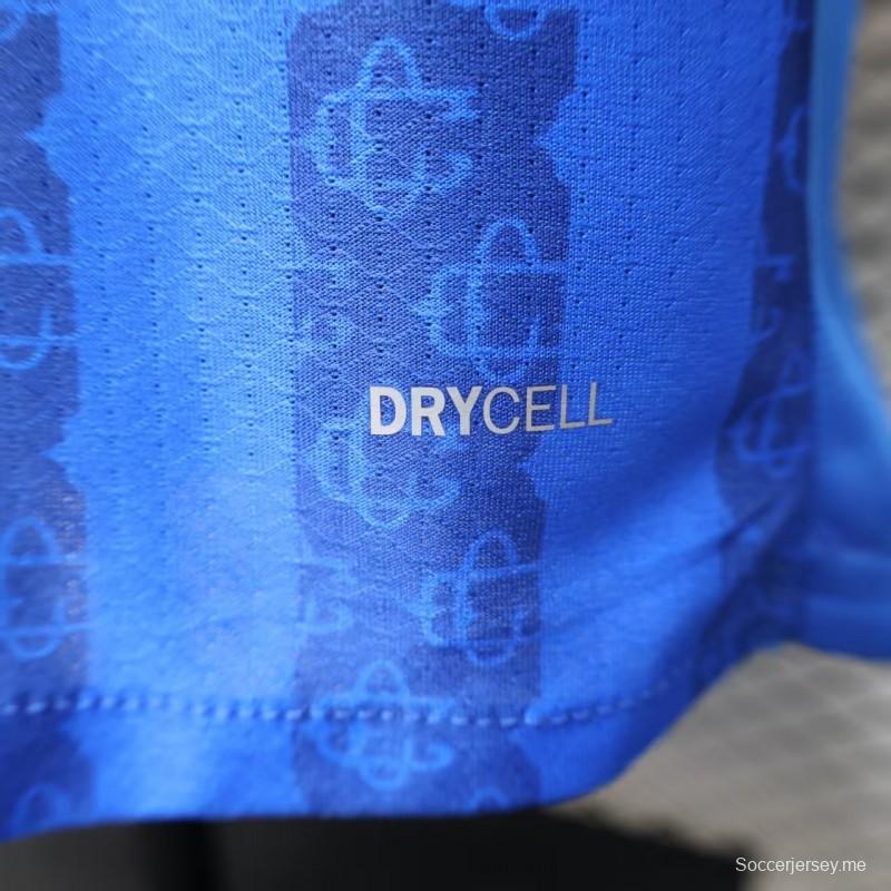 قميص اللاعب رقم 26/27 لفريق تشيفاس غوادالاخارا (قميص خارجي أزرق بنمط خطوط داكنة)