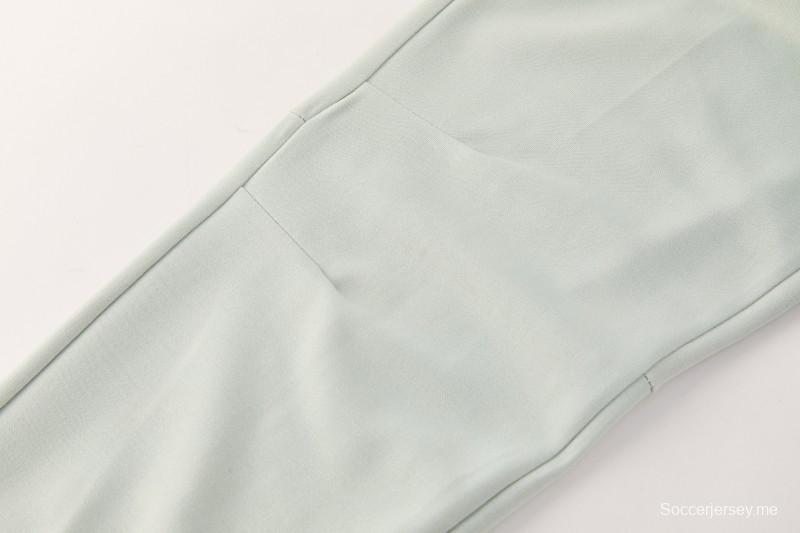 26/27 بدلة رياضية من إنتر ميلان بلون أخضر فاتح مع سحاب كامل وغطاء للرأس + بنطال طويل