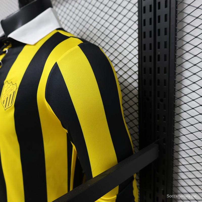 قميص لاعب من طراز 2026، بنقوش عمودية باللونين الأصفر والأسود، بأكمام طويلة، من مجموعة "ريترو هيريتاج" لفريق بينارول