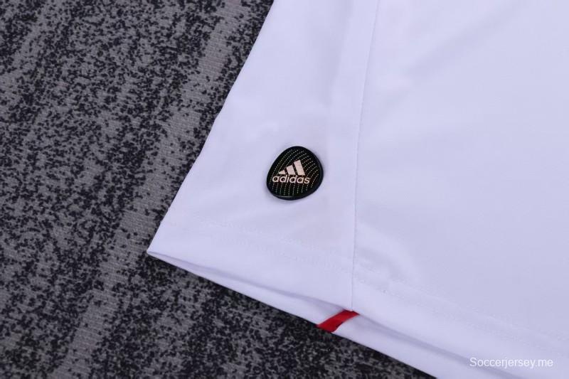 قميص ميلان الأبيض للخارج للأطفال طراز ريترو 2010/11