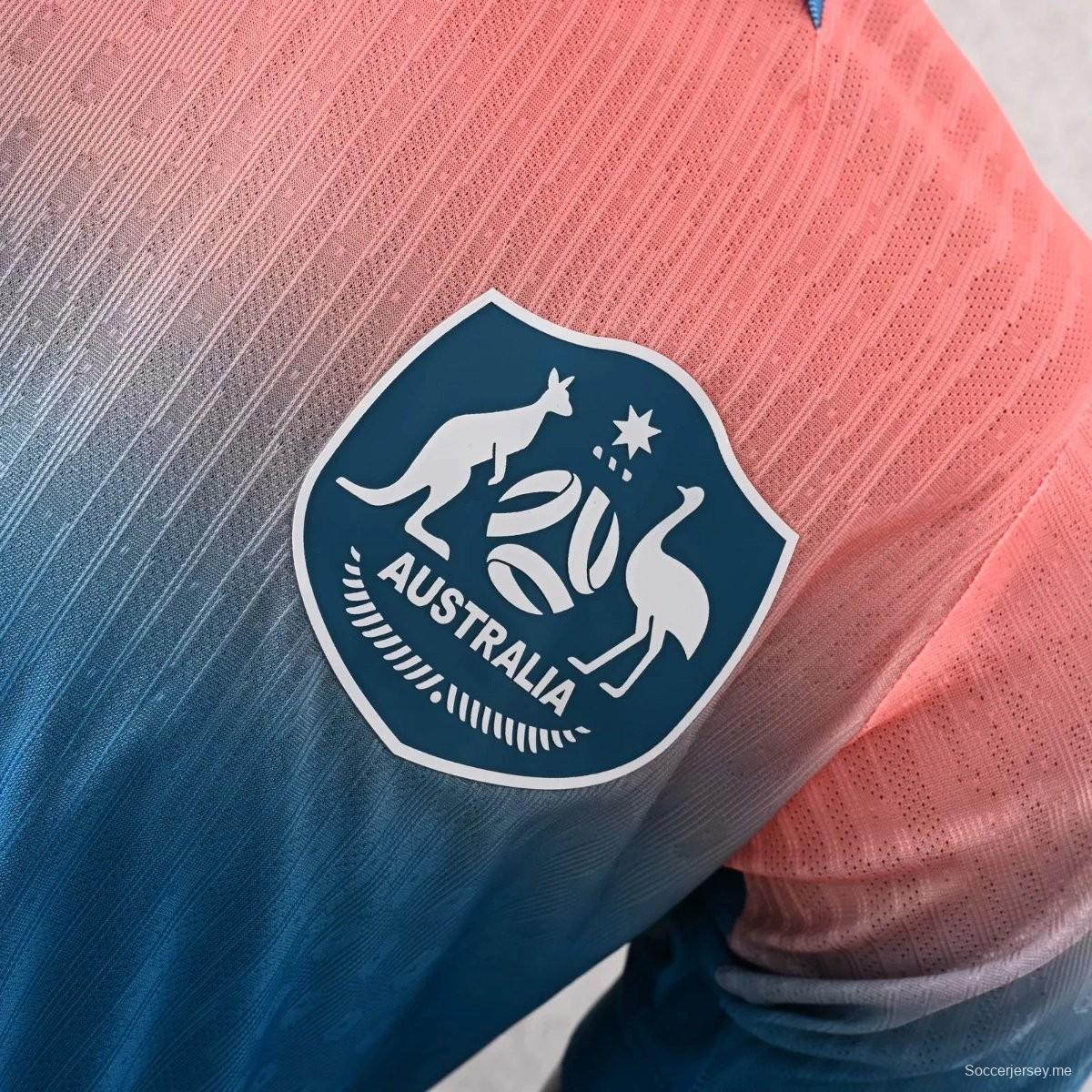 قميص اللاعب خارج الملعب، الإصدار 2026، أستراليا الأزرق مع تدرج لوني من الوردي إلى الأزرق